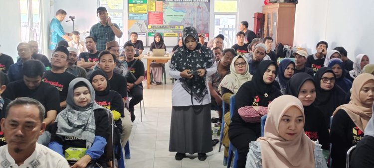 Personil Polsek Tualang Hadiri Sosialisasi Rembuk Kampung Anti Politik Uang ( Money Politic)