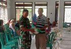 Babinsa Kawal Penyaluran Bantuan Pangan di Guworejo, 767 KK Terima Beras dan Minyak