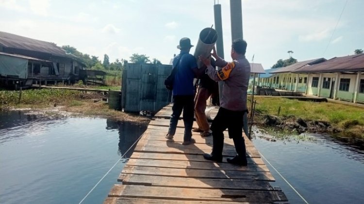 Polres Rohil Bangun Jembatan Akses SDN 025 Bagan Hulu